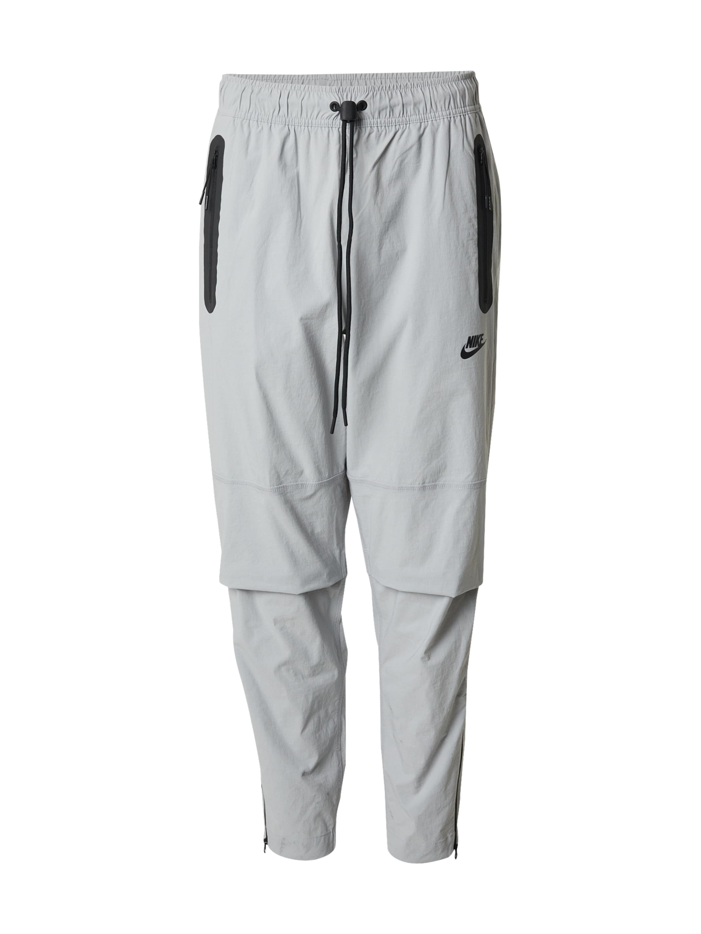 Nike Sportswear Конический (Tapered) Штаны в Серый: спереди