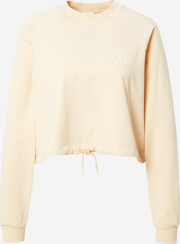 ABOUT YOU x GNTM Sweatshirt 'Xenia' in Beige: front