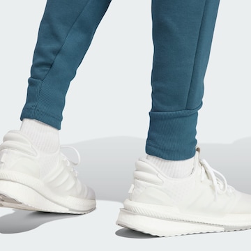 Effilé Pantalon de sport 'Z.N.E. Premium' ADIDAS SPORTSWEAR en bleu