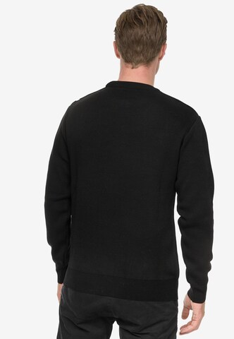 Rusty Neal Pullover in Schwarz