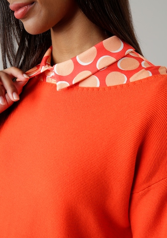 Aniston SELECTED Pullover in Orange