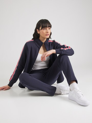 Champion Authentic Athletic Apparel Tracksuit in Blue