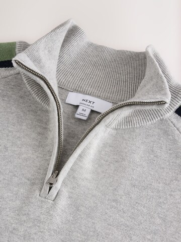 Next Pullover in Grau