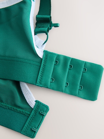 T-shirt Reggiseno sportivo di Next in verde