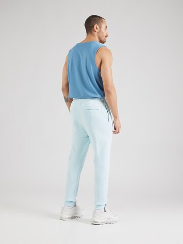 Tapered Pantaloni 'Club Fleece' di Nike Sportswear in blu
