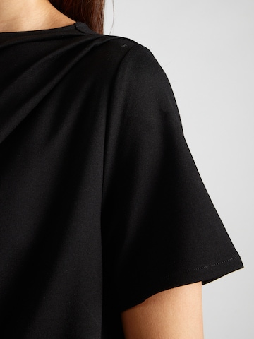 & Other Stories - Camiseta 'Cassendra' en negro