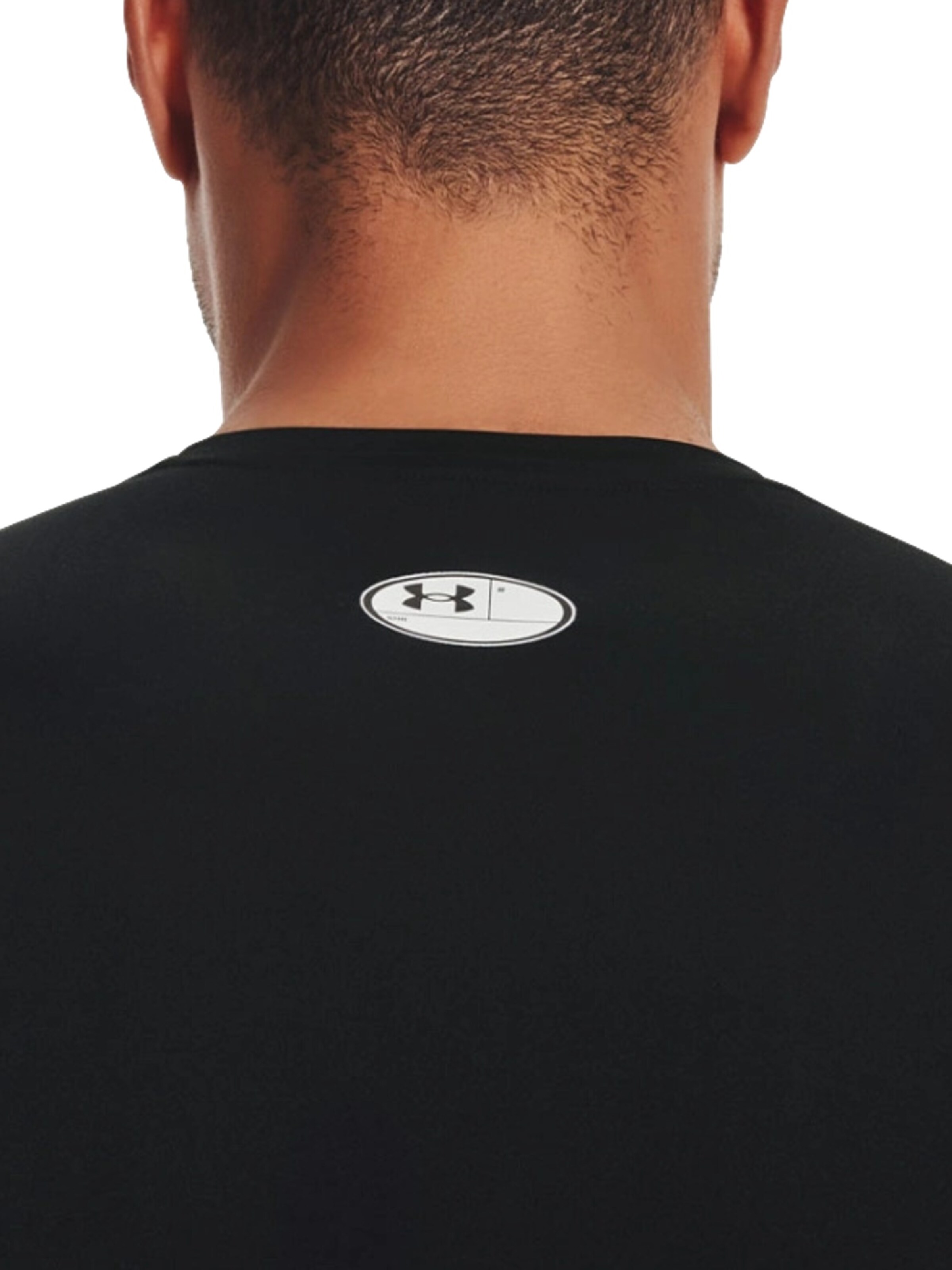 Maglietta di UNDER ARMOUR in nero