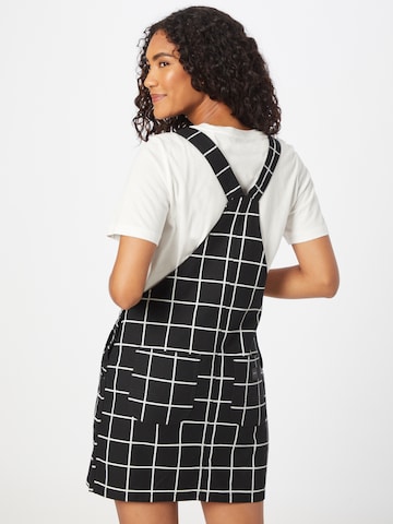 Obey Dungaree skirt in Black