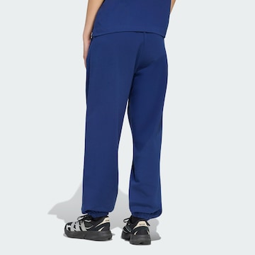 ADIDAS SPORTSWEAR - Tapered Calças de desporto em azul