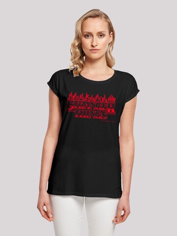 F4NT4STIC T-Shirt 'Stranger Things Flames Netflix TV Series' in Schwarz: predná strana