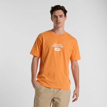 T-Shirt 'Heritage' new balance en orange : devant