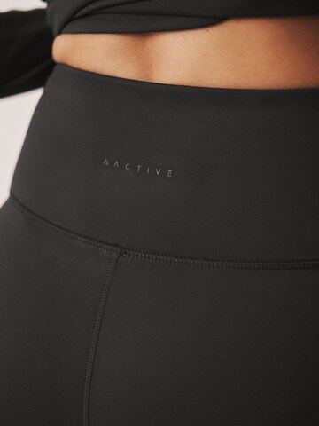 Skinny Pantalon de sport 'Active Balance' Next en noir