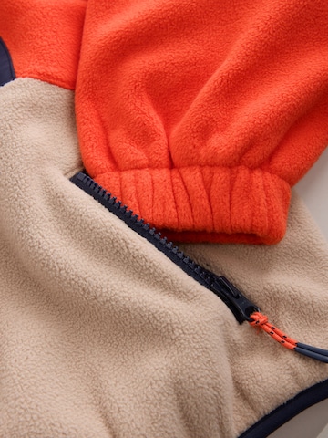 Next Fleece jas in Oranje