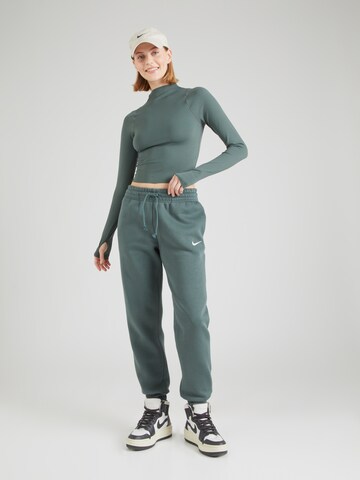 Effilé Pantalon de sport 'Phoenix Fleece' Nike Sportswear en vert