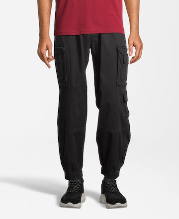 AÉROPOSTALE - Tapered Calças cargo em preto: frente