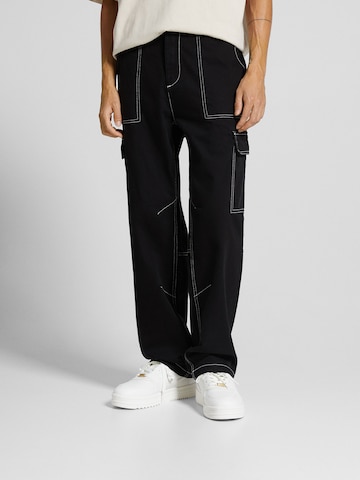 Loosefit Pantalon cargo Bershka en noir : devant