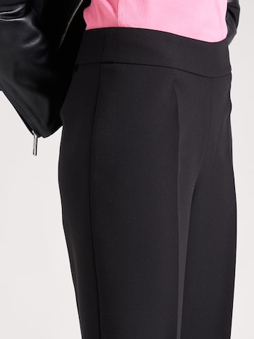 regular Pantaloni con piega frontale 'Haitama' di HUGO in nero