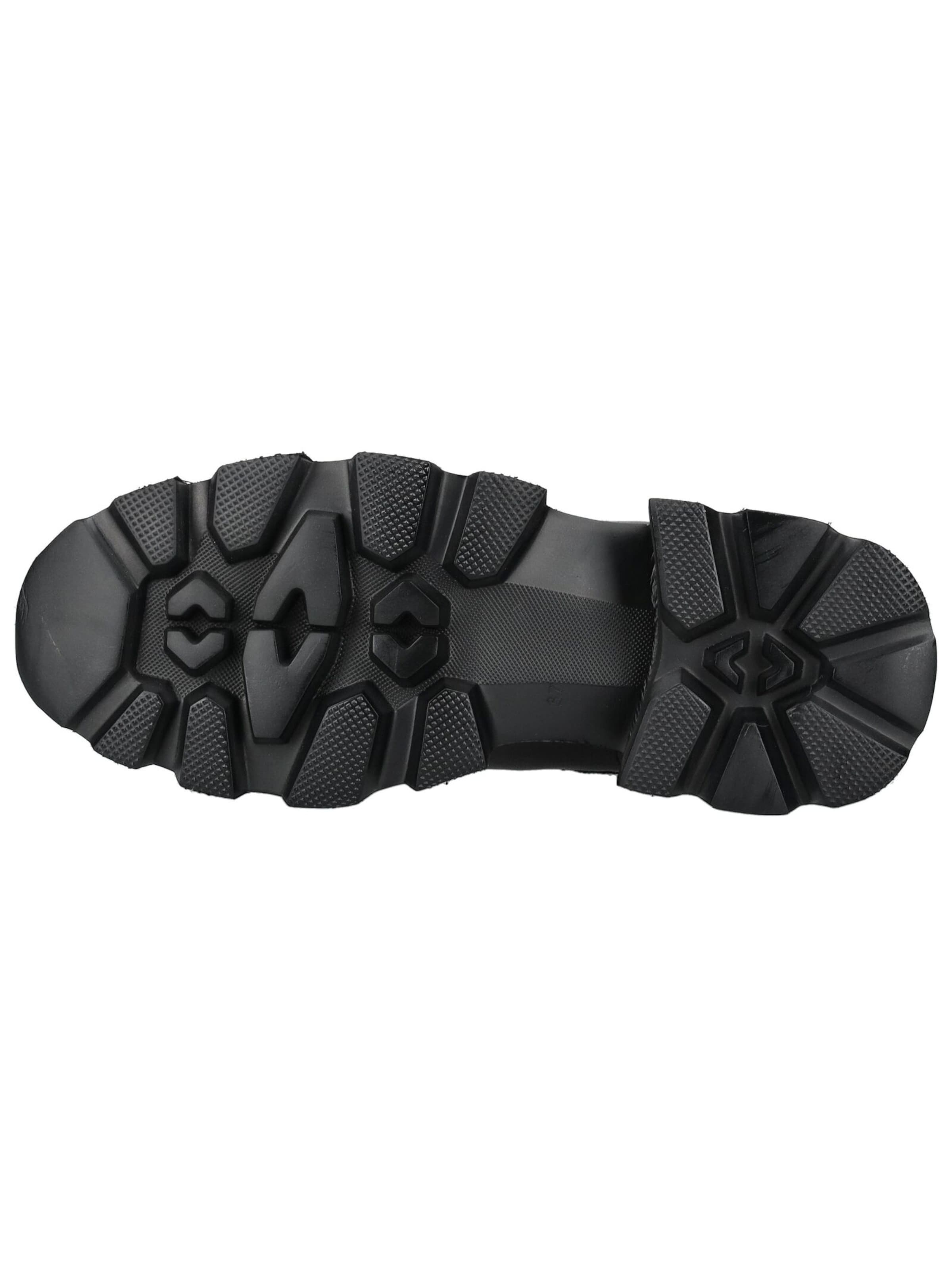 Alma En Pena Chelsea boots in Black