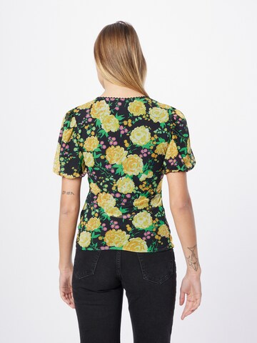 Tricou de la Oasis pe galben