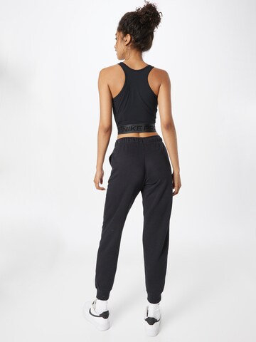 Effilé Pantalon Nike Sportswear en noir