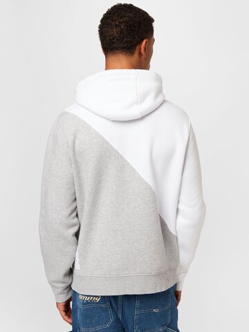 Sweat-shirt Tommy Jeans en blanc