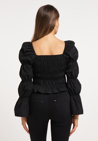 Camicia da donna di faina in nero