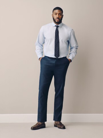Next Slim fit Trousers with creases 'Motionflex' in Blue