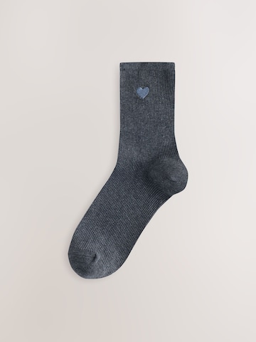 Next Sockor i grå