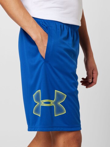 UNDER ARMOUR Lużny krój Spodnie sportowe w kolorze niebieski