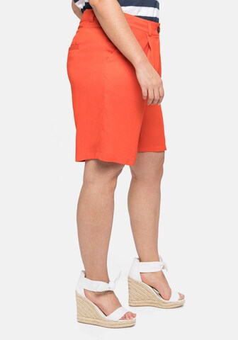 Loosefit Pantalon à pince SHEEGO en orange