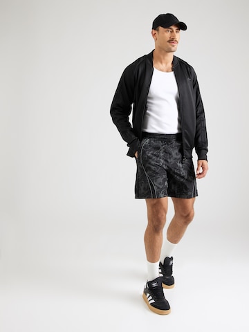 ADIDAS ORIGINALS Loosefit Byxa 'ADILENIUM' i svart