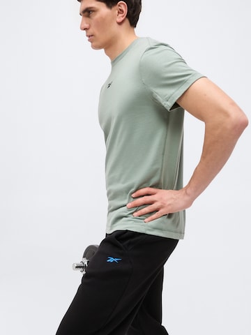 Reebok Zúžený Sportovní kalhoty 'ATHLETE' – černá