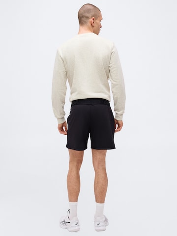 BJÖRN BORG Regular Sports trousers in Black