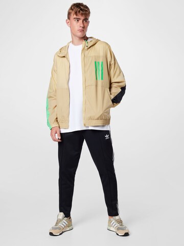 ADIDAS SPORTSWEAR Ulkoilutakki värissä beige