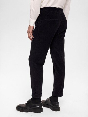 Antioch - Tapered Pantalón plisado en negro