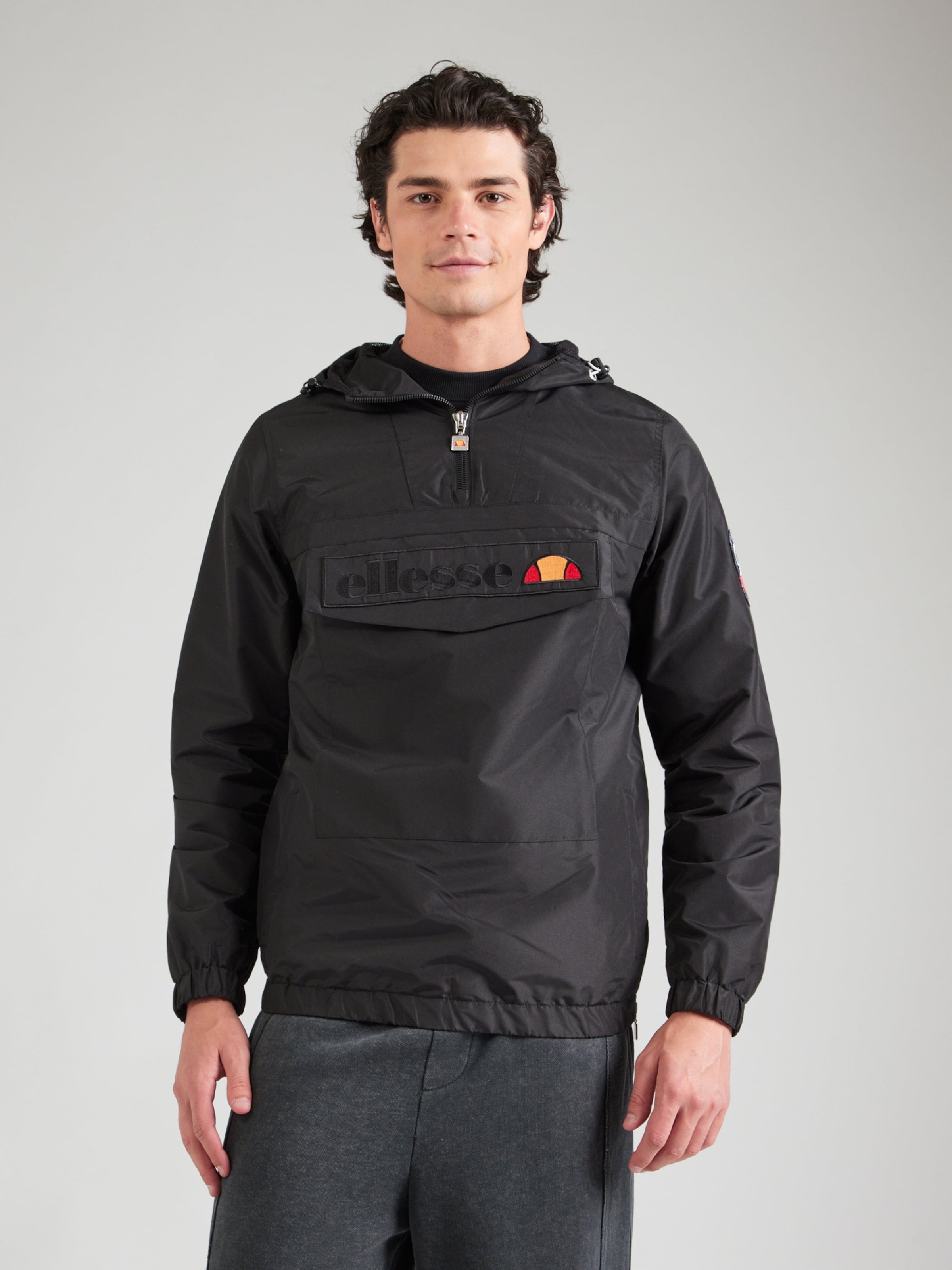 ELLESSE Between-Season Jacket 'Mont 2' in Black | ABOUT YOU
