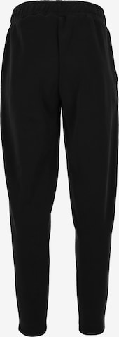 Effilé Pantalon de sport Athlecia en noir