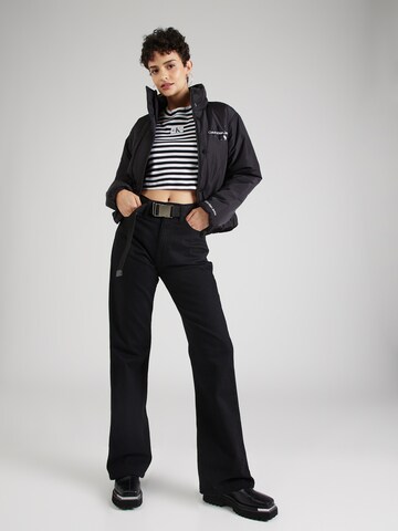 Calvin Klein JeansBootcut/trapezice Traperice 'AUTHENTIC' - crna boja