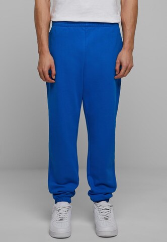 Tapered Pantaloni di Urban Classics in blu