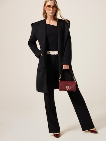oltre - Ropa ancha Pantalón en negro: frente