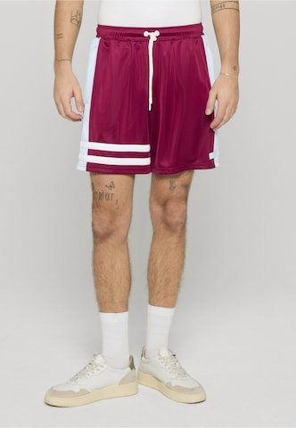 Loosefit Pantaloni 'DMWU' di Unfair Athletics in rosso: frontale