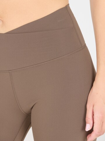 Athlecia Skinny Sports trousers 'Snyder' in Brown