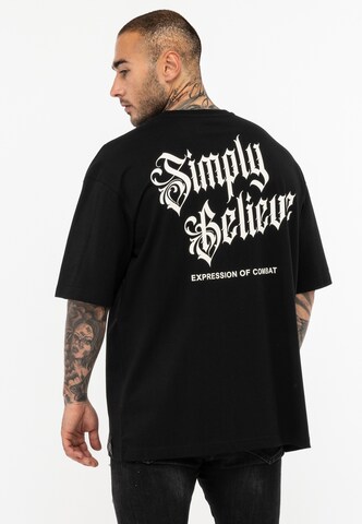 T-Shirt ' SIMPLY BELIEVE ' Tapout en noir