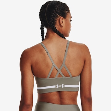 Bustino Reggiseno sportivo di UNDER ARMOUR in verde