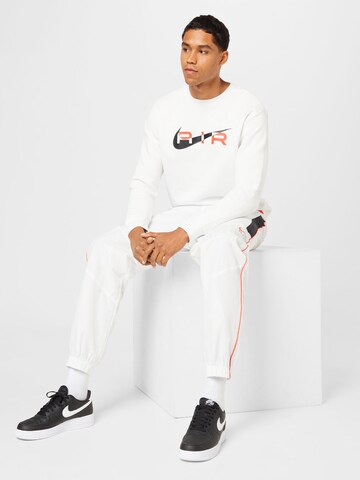 Nike Sportswear Tapered Παντελόνι 'Air' σε λευκό