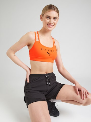 Bustino Reggiseno sportivo 'Puma x Hyrox Move' di PUMA in rosso: frontale
