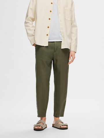 SELECTED - Loosefit Pantalón 'SLHMAGNUS' en verde: frente