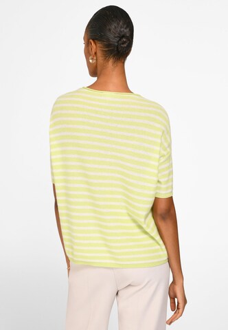 Pull-over include en jaune