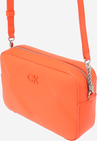 Calvin Klein - Bolso de hombro 'Re-Lock' en naranja
