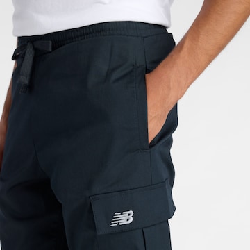new balance - Loosefit Calças cargo em azul